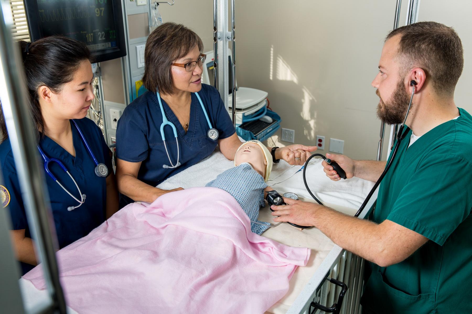 Students in pediatric simulation